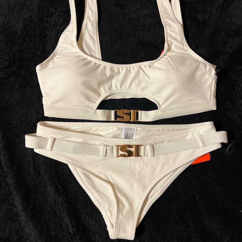 Cute 2 piece both new with tags. Size S and M